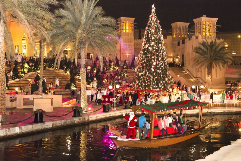 Madinat Jumeirah Festive Market, Dubai Christmas tree, Santa abra boat, roasted chestnuts Dubai - Where to Meet Santa in Dubai, 2025: Top Grottos & Festive Markets